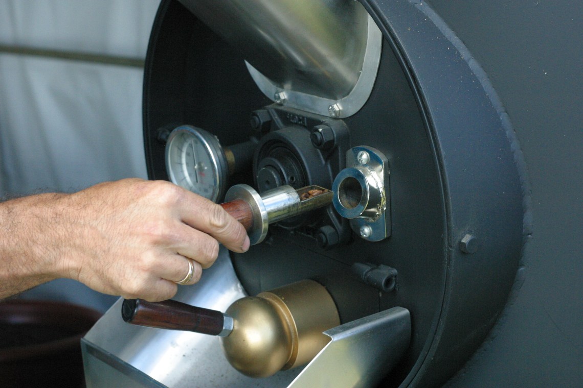 Checking the roast in Frailes, Costa Rica 